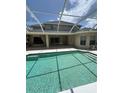 A beautiful screened-in pool with a sunny deck, perfect for relaxation and outdoor entertainment at 10220 Deercliff Dr, Tampa, FL 33647