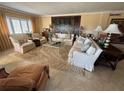 Elegant living room featuring plush seating, tile floors, and sophisticated decor at 1200 N Shore Ne Dr # 212, St Petersburg, FL 33701