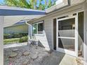 Cozy patio with neutral colors, providing a relaxing place to enjoy the outdoors at 39650 Us Highway 19 N # 411, Tarpon Springs, FL 34689
