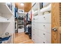 A well-organized walk-in closet with custom shelving and drawers, ideal for storage at 107 S Obrien St # 117, Tampa, FL 33609