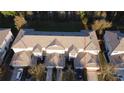 Aerial view of townhome with well-maintained landscaping, featuring neutral colors, and a community layout at 19227 Stone Hedge Dr, Tampa, FL 33647