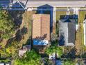 Aerial view of the home showcasing the roof, surrounding yard, and street access at 3101 N 15Th St, Tampa, FL 33605