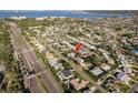 Panoramic aerial view showcases the neighborhood and the home's proximity to the bay at 4127 53Rd S Ave, St Petersburg, FL 33711