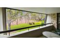 Take in the serene vista of lush greenery from your private balcony at 36750 Us 19 N # 06211, Palm Harbor, FL 34684