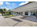 Lovely single-story home with a covered carport and well-kept landscaping at 4105 W Iowa Ave, Tampa, FL 33616