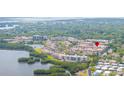 Aerial view of a condo community near water, showcasing the neighborhood at 10034 64Th N Ave # 14, St Petersburg, FL 33708