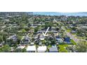 An aerial view of the property showcasing its location among the mature tree cover at 4126 Harrisburg Ne St, St Petersburg, FL 33703