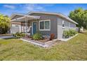 Charming single-story home featuring updated landscaping, well-maintained lawn and freshly painted exterior at 5758 20Th N Ave, St Petersburg, FL 33710