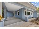Attached carport providing covered parking and easy access to the house at 1039 23Rd St, Sarasota, FL 34234