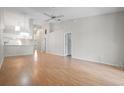 Spacious living room with high ceilings and modern light fixture offers a comfortable atmosphere at 39650 Us Highway 19 N # 615, Tarpon Springs, FL 34689
