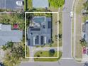 Drone shot shows entire property; a home with pool and solar panels. Property lines are digitally highlighted at 5953 36Th N Ave, St Petersburg, FL 33710