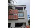 Exterior construction featuring modern design, window placements, and framework at 4509 W North A St # 1, Tampa, FL 33609