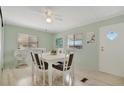 Inviting dining area with a modern table set and stylish decor at 110 E Saint Lucia Loop, Apollo Beach, FL 33572