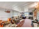 Inviting living room with cozy furnishings, a large window, and a warm atmosphere at 1710 7Th Sw St # 95, Ruskin, FL 33570