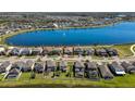 Beautiful aerial view of a lakeside home nestled in a vibrant community at 19793 Long Lake Ranch Blvd, Lutz, FL 33558