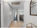 Bright entryway featuring tiled flooring and closet space at 9940 47Th N Ave # 210, St Petersburg, FL 33708
