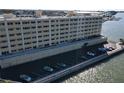 Condo building on waterfront, offering convenient parking and direct access to the bay at 100 Bluff View Dr # 502C, Belleair Bluffs, FL 33770