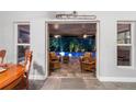 View of outdoor living area featuring cushioned seating and a screened in pool at 2814 47Th S St, Gulfport, FL 33711