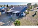 Backyard view showcasing the screened-in lanai at 3914 41St W St, Bradenton, FL 34205