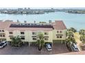 Charming two-story condo with a garage and brick paved parking at 553 Haven Point Dr, Treasure Island, FL 33706