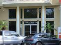 Building entrance with large glass windows, offering a glimpse into the building's interior at 750 4Th S Ave # 603C, St Petersburg, FL 33701
