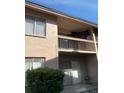 Exterior balcony featuring neutral finishes and metal railing at 7526 Needle Leaf Pl # 30, Tampa, FL 33617