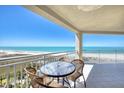 Enjoy breathtaking ocean views from the comfort of your private balcony with table and chairs at 1180 Gulf Blvd # 1201, Clearwater, FL 33767