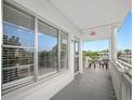 Balcony view featuring decorative railings and access to condo unit at 2428 Columbia Dr # 72, Clearwater, FL 33763