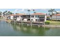 Waterfront condos featuring private balconies with outdoor seating overlooking the serene waters and lush landscape at 6277 Bahia Del Mar Blvd # 210, St Petersburg, FL 33715