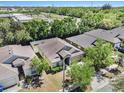 A peaceful residential neighborhood with mature trees surrounding a cozy single-Gathering home at 405 Laguna Mill Dr, Ruskin, FL 33570