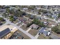 Aerial view of a residential neighborhood showcasing various homes and surrounding landscapes at 6527 Grapewood Rd, Spring Hill, FL 34609