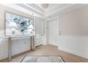 Bright hallway featuring elegant decor, modern lighting, and stylish accents to complement the residence at 2410 Harbourside Dr # 142, Longboat Key, FL 34228