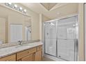 Well-lit bathroom featuring a glass-enclosed shower, updated vanity, and modern fixtures at 5125 Palm Springs Blvd # 11306, Tampa, FL 33647