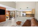 Bright and airy living room featuring a vaulted ceiling, modern fixtures, and an open layout at 6262 142Nd N Ave # 1304, Clearwater, FL 33760