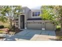 Charming two story home with a three car garage, fresh paint, and a covered porch at 10818 Breaking Rocks Dr, Tampa, FL 33647