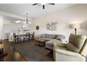 Bright living space with open layout to dining area and comfortable seating at 1120 Radison Ave # 6, Sun City Center, FL 33573