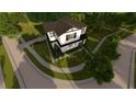Aerial view of a beautiful two-story home with a driveway at 1215 E Broad St, Tampa, FL 33604