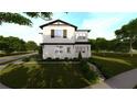 Inviting two-story home with manicured bushes and steps leading to the front entrance at 1215 E Broad St, Tampa, FL 33604
