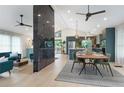 Open-concept floorplan seamlessly connects living and dining areas, creating a modern gathering space at 1320 Coral S Way, St Petersburg, FL 33705