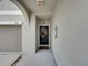 Covered front door with wreath at 5210 Dandelion St, Apollo Beach, FL 33572