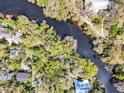 A vacant lot with direct access to the river and an outline of the property's boundaries at 57 Hamilton Heath Dr Dr, Tampa, FL 33604
