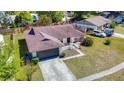 Aerial view showcases a well-maintained roof and landscaping of this charming home at 6826 Rosemary Dr, Tampa, FL 33625