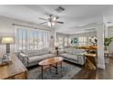 Inviting living room showcasing hardwood floors, comfortable seating, and abundant natural light at 145 38Th Ne Ave, St Petersburg, FL 33704