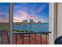 Balcony view showcasing scenic water views and vibrant sky at 6158 Palma Del Mar S Blvd # 406, St Petersburg, FL 33715