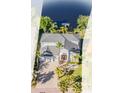Aerial view of a two-story home with lush landscaping and a driveway at 17927 Bahama Isle Cir, Tampa, FL 33647