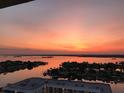 Stunning sunset view overlooking the waterfront neighborhood and bay at 400 Island Way # 1708, Clearwater Beach, FL 33767