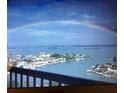 Incredible waterfront view with a rainbow over the neighborhood and waterway at 400 Island Way # 1708, Clearwater Beach, FL 33767