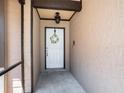 Close-up of the front door with a wreath, showing the entryway and exterior wall at 2412 Arborwood Dr, Valrico, FL 33596