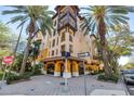 Beautiful building featuring a stylish corner view surrounded by palm trees at 100 4Th S Ave # 207, St Petersburg, FL 33701