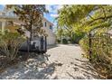 Gated driveway leading to a garage, providing privacy and security for residents at 3010 82Nd N Way, St Petersburg, FL 33710